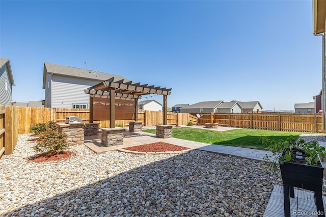 view of yard featuring a patio area, a pergola, and a fenced backyard