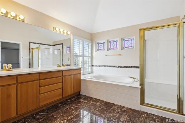 bathroom with vanity, independent shower and bath, and lofted ceiling