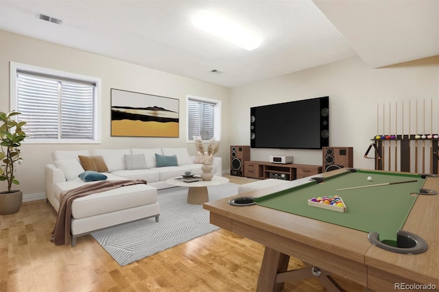 recreation room with hardwood / wood-style floors and pool table