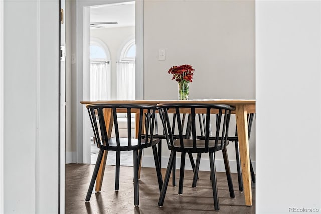 dining room with dark hardwood / wood-style floors