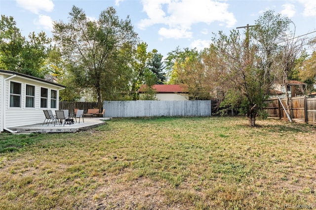 view of yard with a patio area