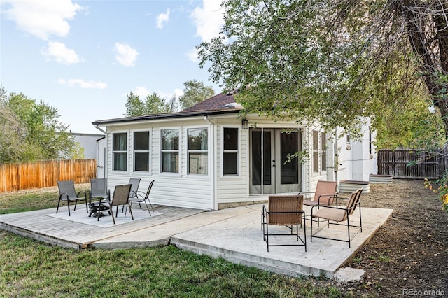 back of house featuring french doors and a patio