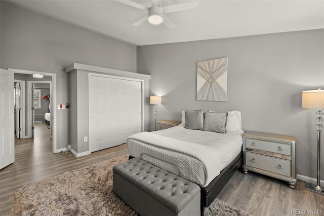 2970 Leoti Dr, Colorado Springs, CO 80922 - bedroom with wood finished floors, lofted ceiling, baseboards, a closet, and ceiling fan