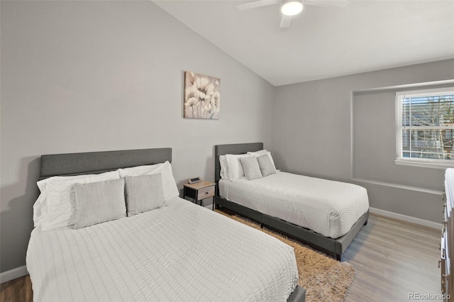 2970 Leoti Dr, Colorado Springs, CO 80922 - bedroom with lofted ceiling, wood finished floors, baseboards, and a ceiling fan