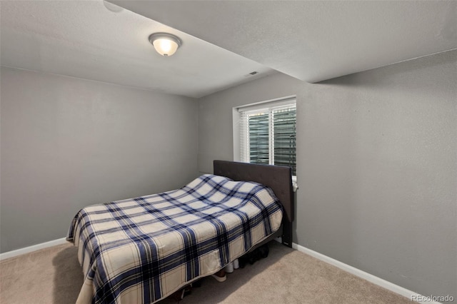 2970 Leoti Dr, Colorado Springs, CO 80922 - bedroom featuring carpet flooring and baseboards