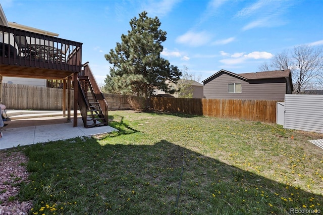 2970 Leoti Dr, Colorado Springs, CO 80922 - view of yard with a patio area, stairway, and a wooden deck