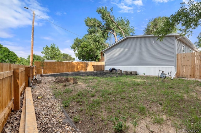 811 Plum Ave N, Lochbuie, CO 80603 - view of home's exterior with a fenced backyard