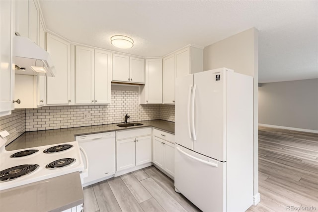 2160 S Vaughn Way Unit 104C, Aurora, CO 80014 - kitchen with a sink, white appliances, light wood-style flooring, and white cabinetry