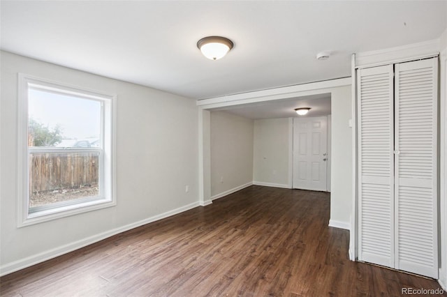 1301 Kenton St, Aurora, CO 80010 - unfurnished room with dark wood-type flooring and a smoke detector