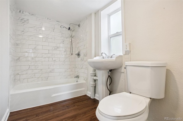 1301 Kenton St, Aurora, CO 80010 - full bath featuring wood finished floors and shower / bath combination