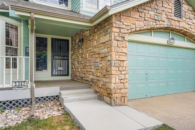 5362 S Danube Ct, Centennial, CO 80015 - property entrance with covered porch, roof with shingles, and stone siding