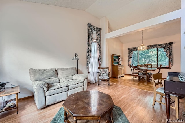 5362 S Danube Ct, Centennial, CO 80015 - living area featuring lofted ceiling and light wood-style floors