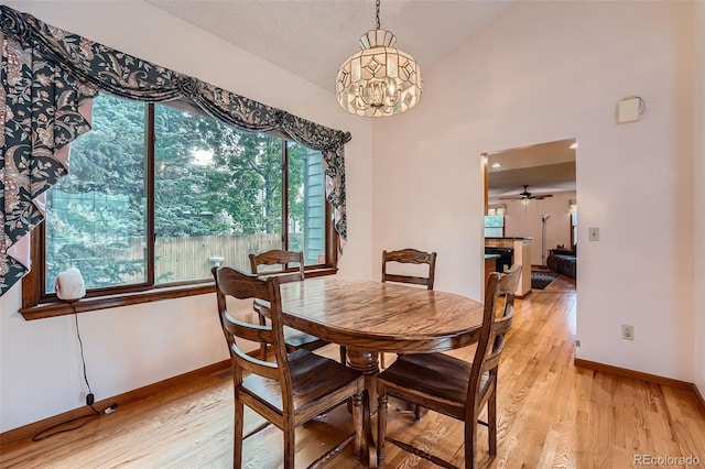 5362 S Danube Ct, Centennial, CO 80015 - dining area featuring light wood-type flooring, ceiling fan, and a chandelier