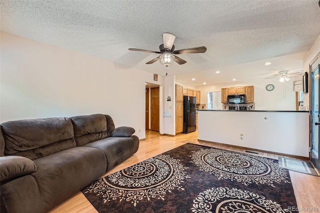 5362 S Danube Ct, Centennial, CO 80015 - living area with ceiling fan, light wood-type flooring, a textured ceiling, and recessed lighting