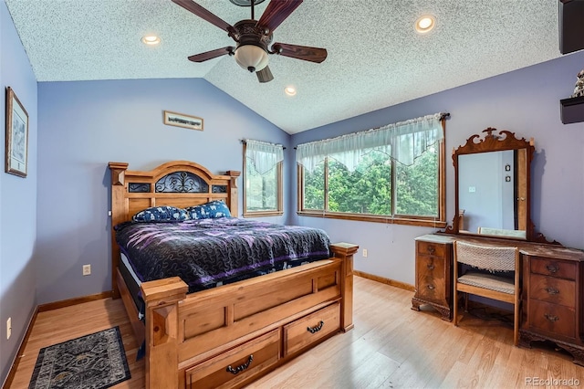 5362 S Danube Ct, Centennial, CO 80015 - bedroom with light wood-type flooring, a textured ceiling, vaulted ceiling, and a ceiling fan