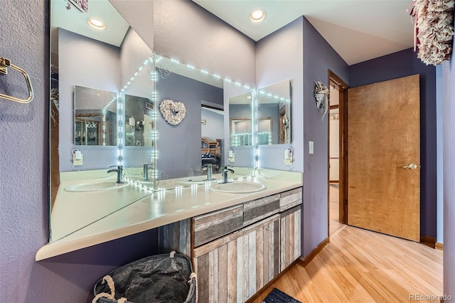 5362 S Danube Ct, Centennial, CO 80015 - full bath with wood finished floors and double vanity