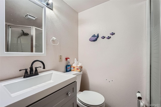 5362 S Danube Ct, Centennial, CO 80015 - full bath featuring a shower stall, vanity, and a textured wall