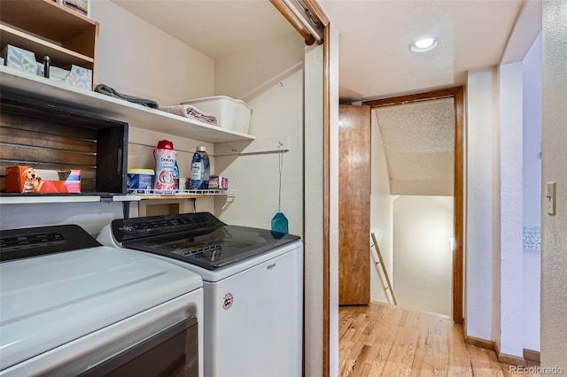 5362 S Danube Ct, Centennial, CO 80015 - washroom featuring washer and clothes dryer, light wood-style floors, and recessed lighting
