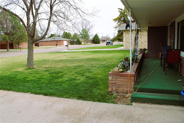 view of yard featuring a garage