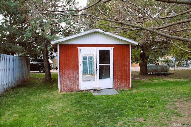 view of outdoor structure featuring a yard