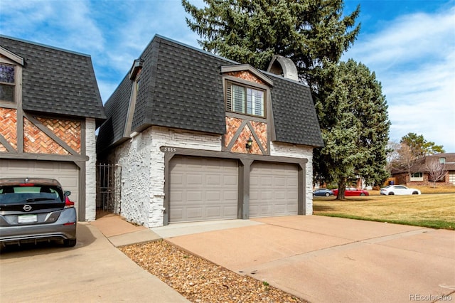 view of front facade with mansard roof, a shingled roof, a garage, and concrete driveway