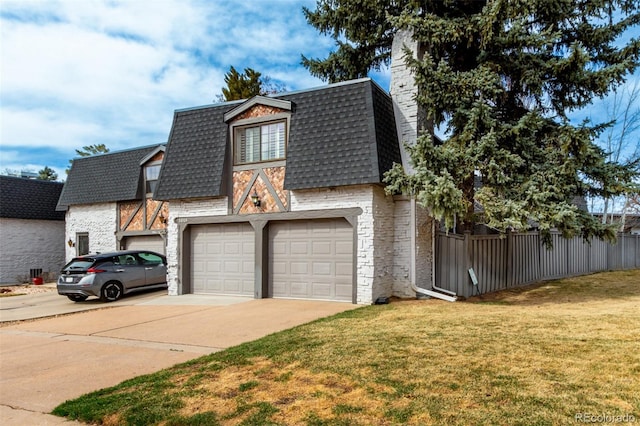 view of front of house featuring a front yard, fence, driveway, roof with shingles, and mansard roof