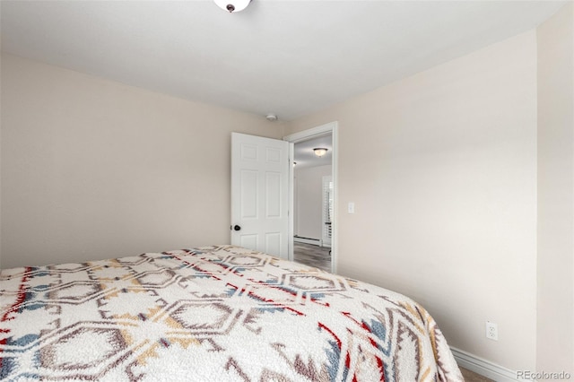 bedroom featuring baseboard heating