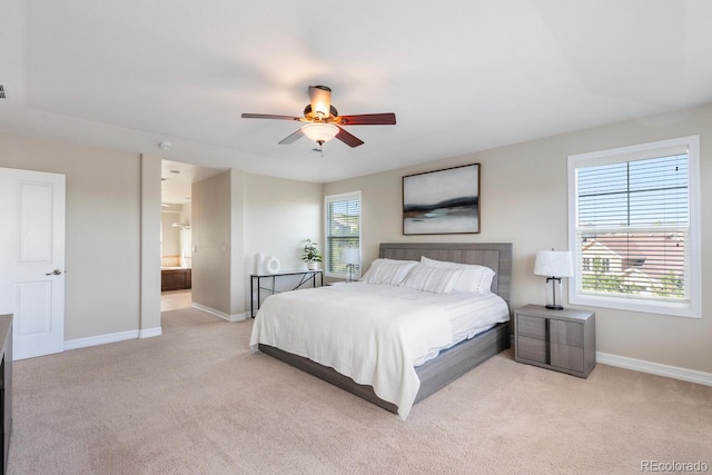 1519 Stonehill Ct, Castle Rock, CO 80104 - bedroom featuring light colored carpet, baseboards, ceiling fan, and connected bathroom