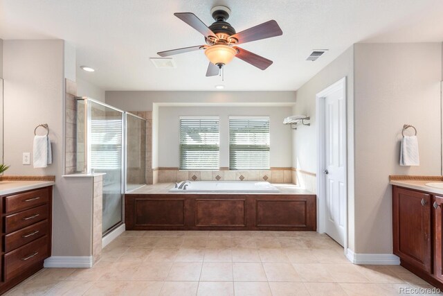 1519 Stonehill Ct, Castle Rock, CO 80104 - full bath featuring vanity, a stall shower, ceiling fan, and a bath