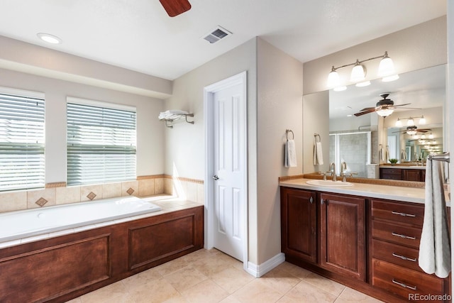 1519 Stonehill Ct, Castle Rock, CO 80104 - bathroom featuring a ceiling fan, a shower stall, vanity, and tile patterned floors