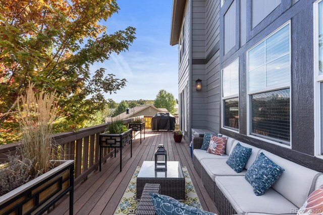 1519 Stonehill Ct, Castle Rock, CO 80104 - wooden terrace featuring outdoor lounge area