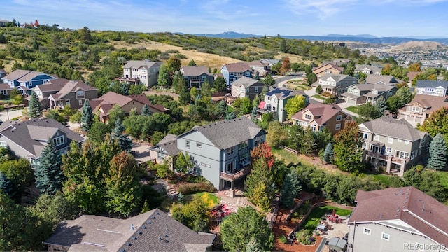 1519 Stonehill Ct, Castle Rock, CO 80104 - aerial view of property and surrounding area with nearby suburban area and mountains