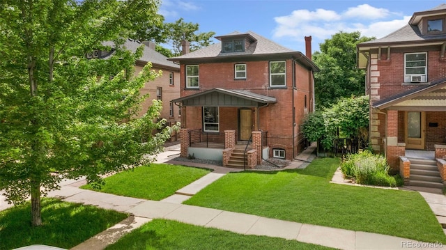 2849 N Vine St, Denver, CO 80205 - traditional style home featuring a porch, a front lawn, brick siding, and cooling unit
