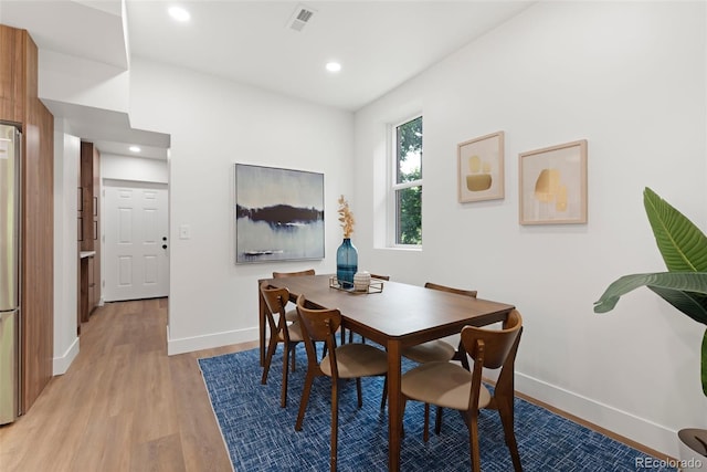 2849 N Vine St, Denver, CO 80205 - dining area featuring light wood-style floors and recessed lighting