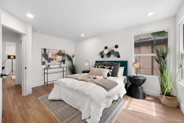 2849 N Vine St, Denver, CO 80205 - bedroom with wood finished floors and recessed lighting