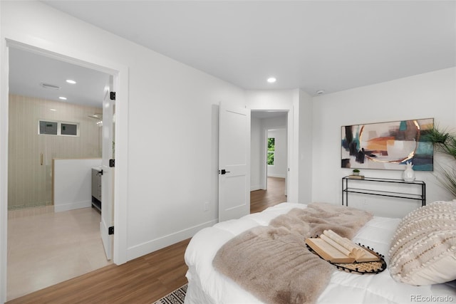 2849 N Vine St, Denver, CO 80205 - bedroom with recessed lighting and wood finished floors