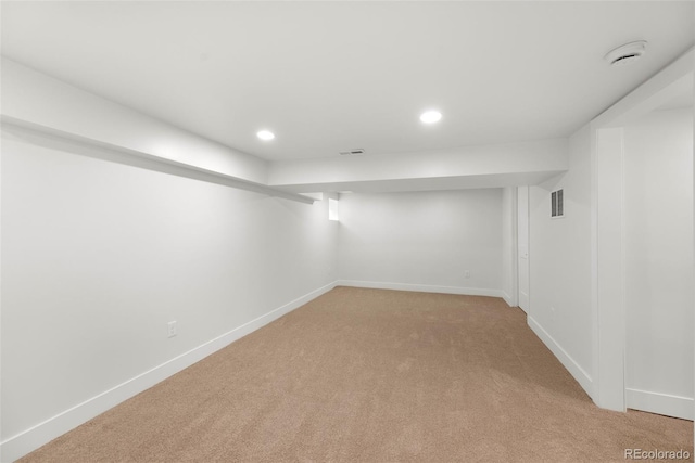 2849 N Vine St, Denver, CO 80205 - finished basement with light colored carpet and recessed lighting