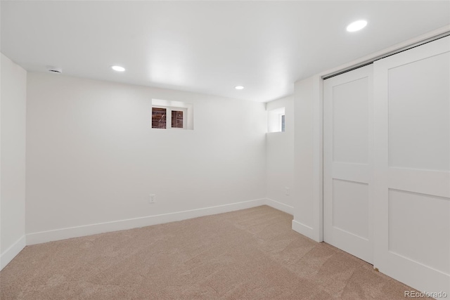2849 N Vine St, Denver, CO 80205 - basement featuring light carpet and recessed lighting