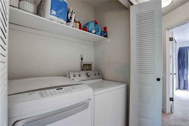 9519 W Coal Mine Ave Unit F, Littleton, CO 80123 - washroom with separate washer and dryer and light carpet