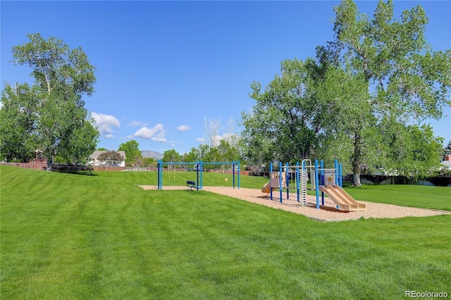 9519 W Coal Mine Ave Unit F, Littleton, CO 80123 - community playground featuring a lawn