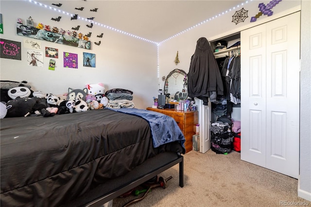 carpeted bedroom featuring a closet