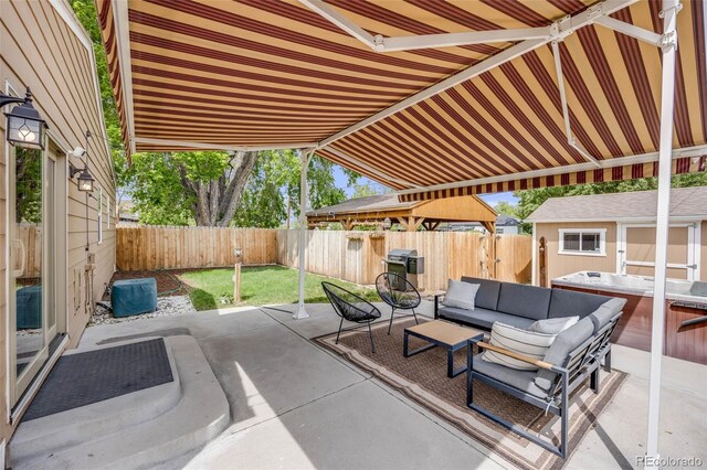 430 Osceola St, Denver, CO 80204 - fenced backyard featuring a patio area, an outdoor living space, and an outbuilding