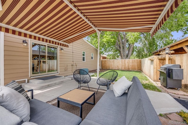 430 Osceola St, Denver, CO 80204 - fenced backyard featuring area for grilling, an outdoor living space, and a patio area