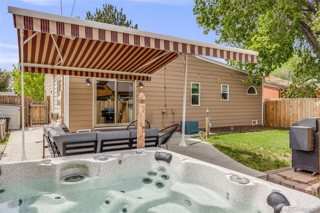430 Osceola St, Denver, CO 80204 - view of patio with a gate, an outdoor hangout area, and a hot tub