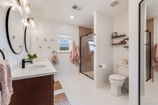 430 Osceola St, Denver, CO 80204 - full bath with toilet, double vanity, a stall shower, and recessed lighting