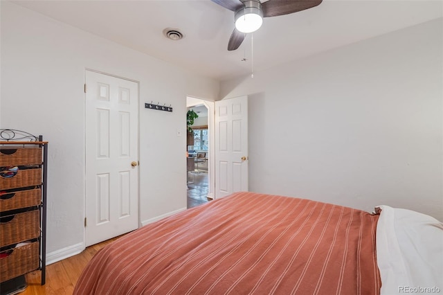 430 Osceola St, Denver, CO 80204 - bedroom with light wood-style floors, baseboards, and a ceiling fan