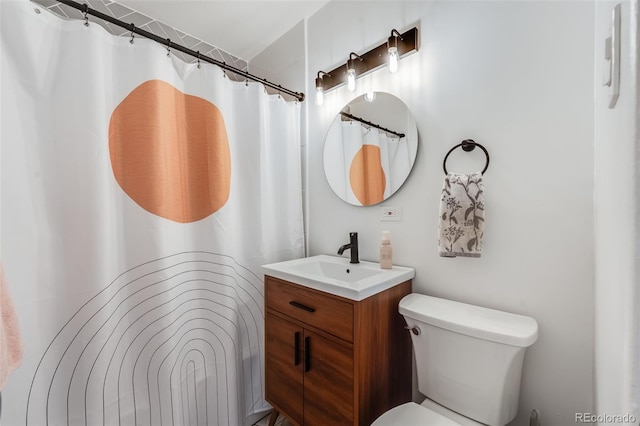430 Osceola St, Denver, CO 80204 - full bathroom featuring vanity, toilet, and a shower with shower curtain