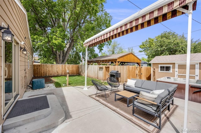 430 Osceola St, Denver, CO 80204 - fenced backyard featuring a gazebo, a patio, an outdoor living space, and an outdoor hot tub