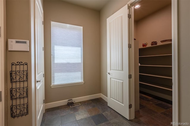 3012 Cathedral Park Vw, Colorado Springs, CO 80904 - interior space featuring baseboards and stone tile flooring