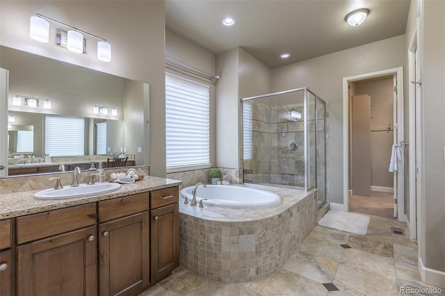 3012 Cathedral Park Vw, Colorado Springs, CO 80904 - full bathroom with a shower stall, a garden tub, vanity, and tile patterned floors